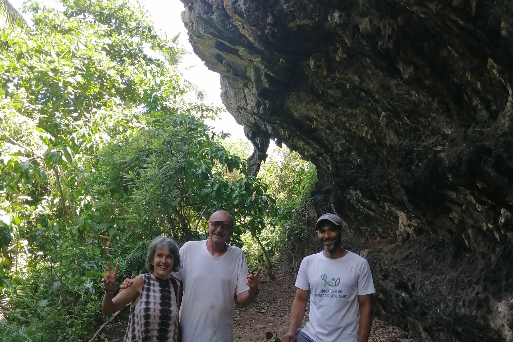 Our three founding partners standing together on the Frutos Pachamama farm in Samaná, Dominican Republic